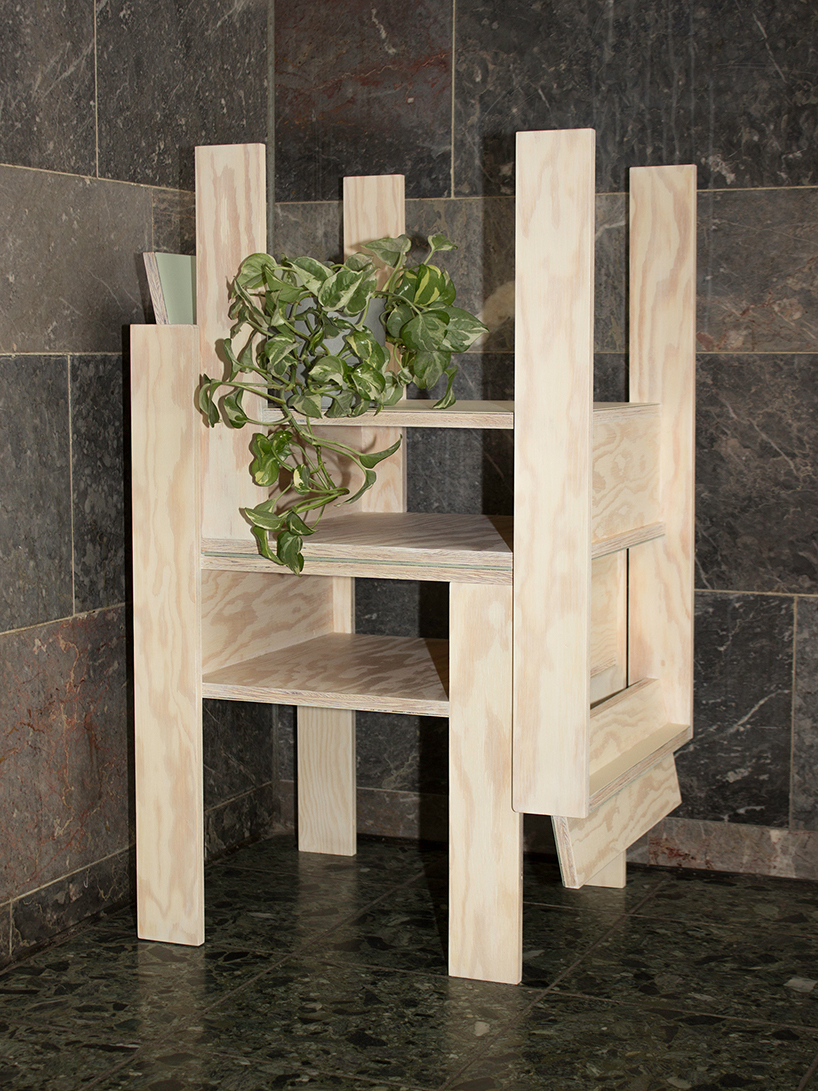 a pair of twin wooden chairs by A204 reconfigure into tables with drawers and shelving units