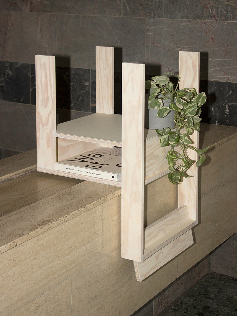 a pair of twin wooden chairs by A204 reconfigure into tables with drawers and shelving units