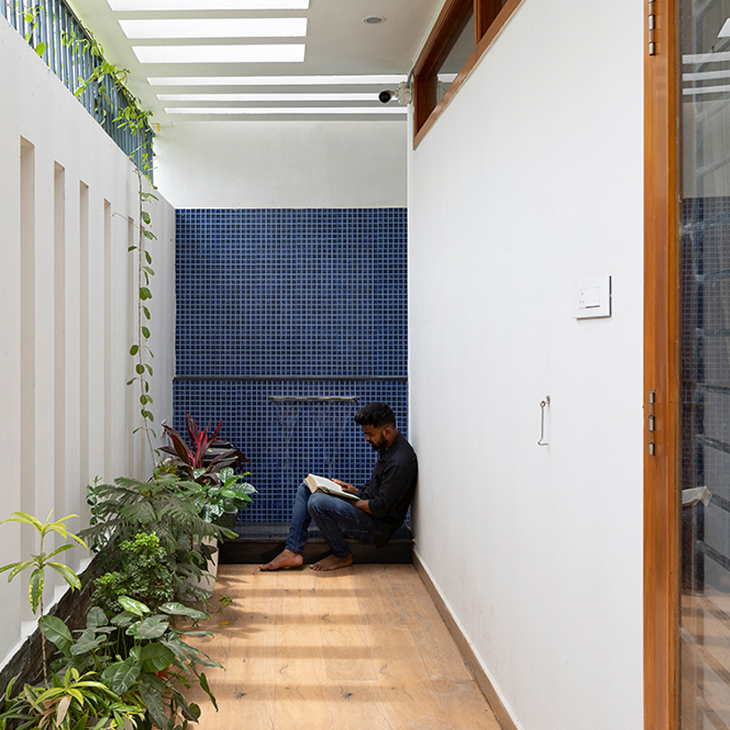 perforated brick planes invite light and shade into D.L.E.A's house in chennai