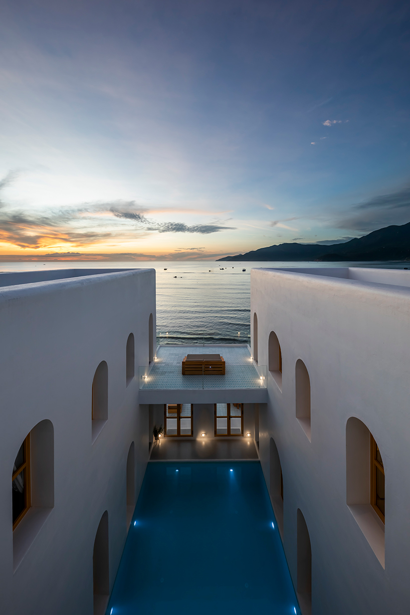 pham huu son delves into mediterranean architecture for beachfront villa in vietnam