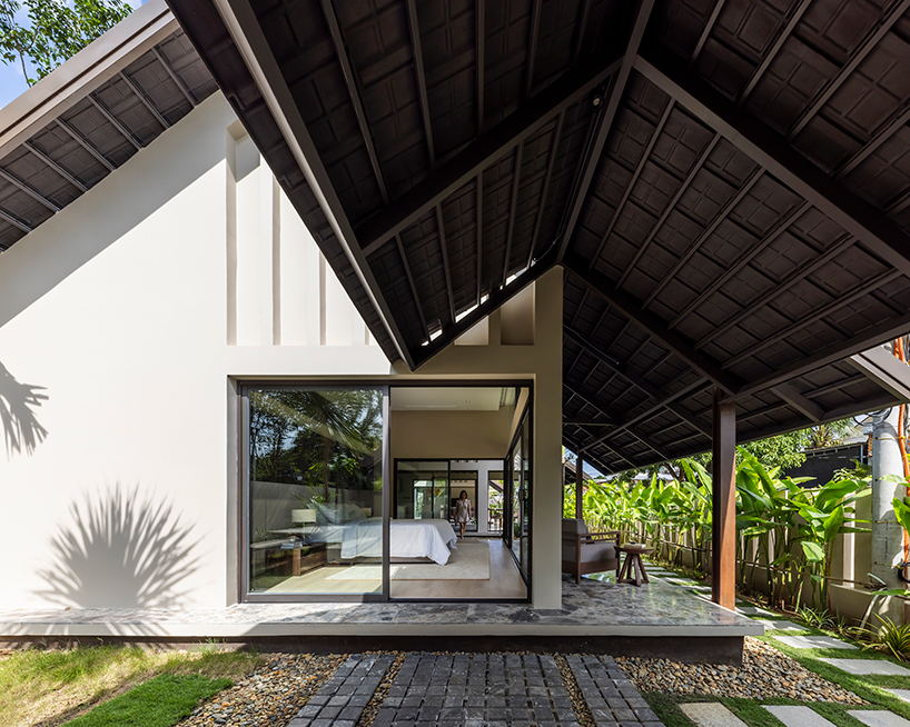 five interlaced gabled roofs, top pham huu son, ha architects garden house in vietnam