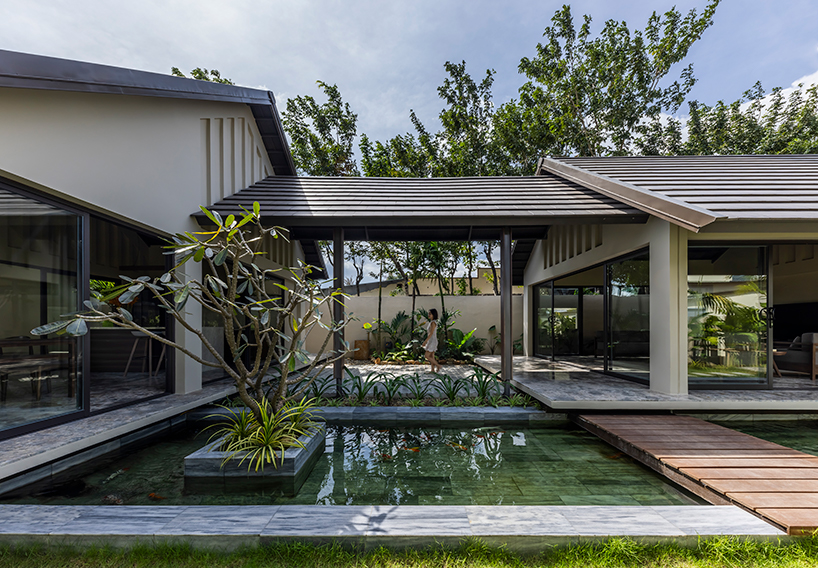 five interlaced gabled roofs, top pham huu son, ha architects garden house in vietnam