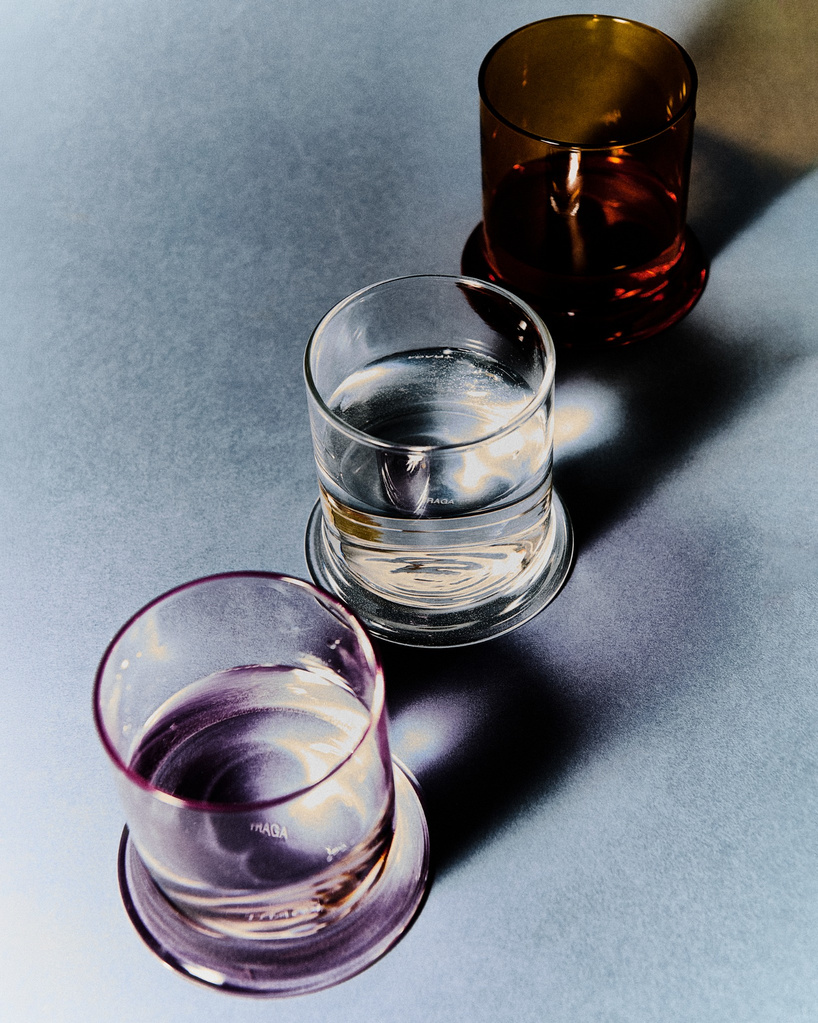 borosilicate drinking glass creates optical illusion of liquid melting into table - 1