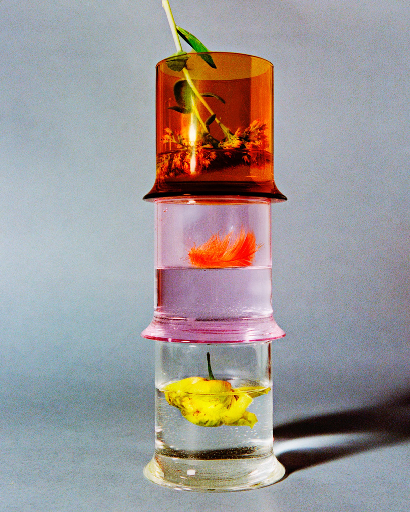 borosilicate drinking glass creates optical illusion of liquid melting into table - 2