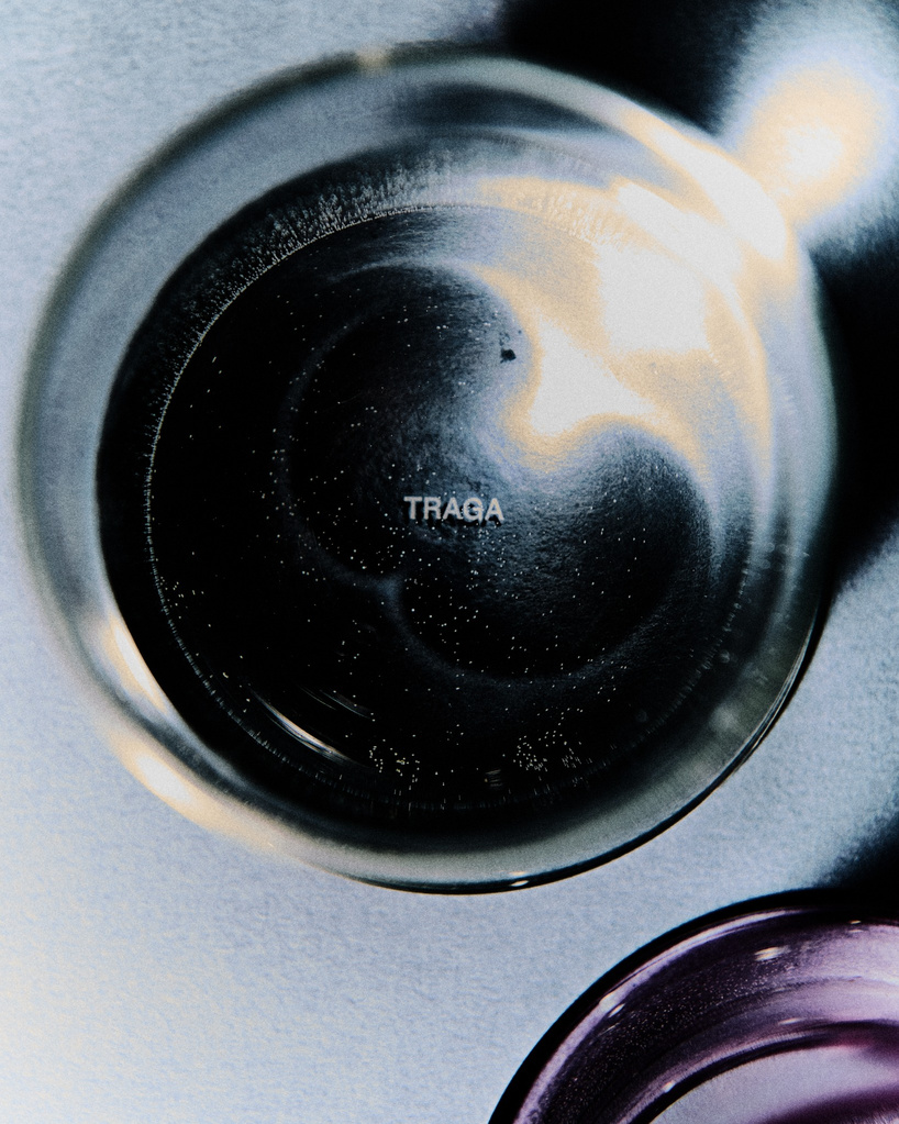 borosilicate drinking glass creates optical illusion of liquid melting into table - 7