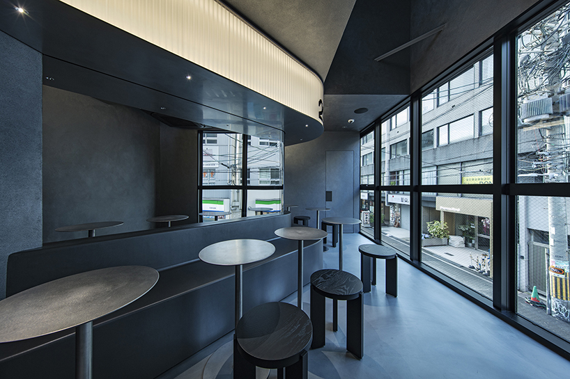 diagonal forms and illuminated curves outline 2050 coffee shop along osaka’s midosuji axis - 2