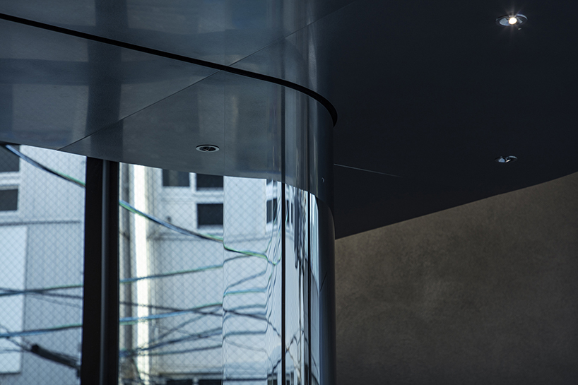 diagonal forms and illuminated curves outline 2050 coffee shop along osaka’s midosuji axis - 7