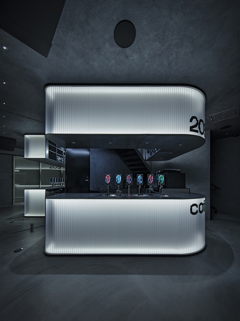 diagonal forms and illuminated curves outline 2050 coffee shop along osaka’s midosuji axis - 5