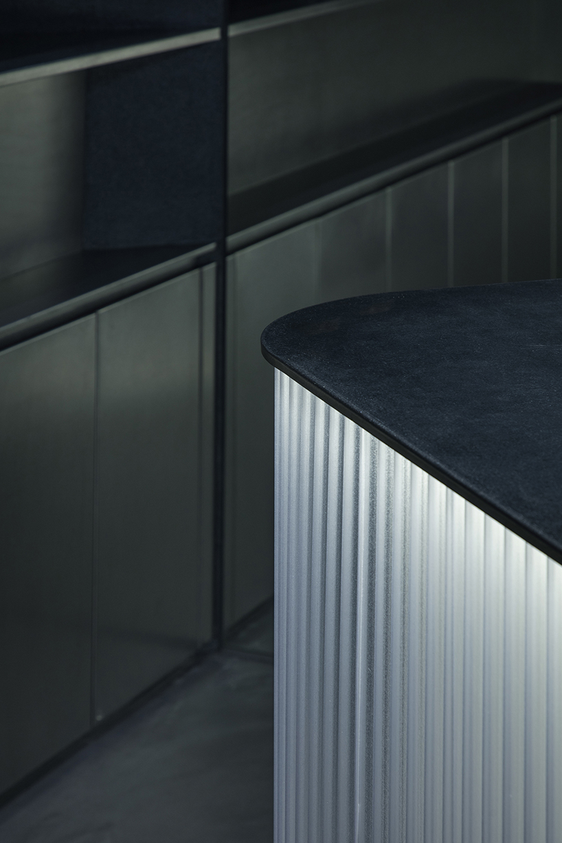 diagonal forms and illuminated curves outline 2050 coffee shop along osaka’s midosuji axis - 10