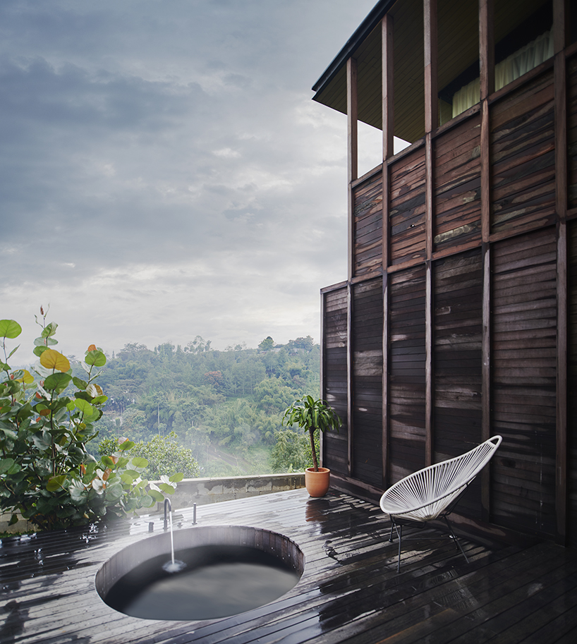 feel the warmth of wooden lodge on a hill at the halojae hotel in indonesia 7