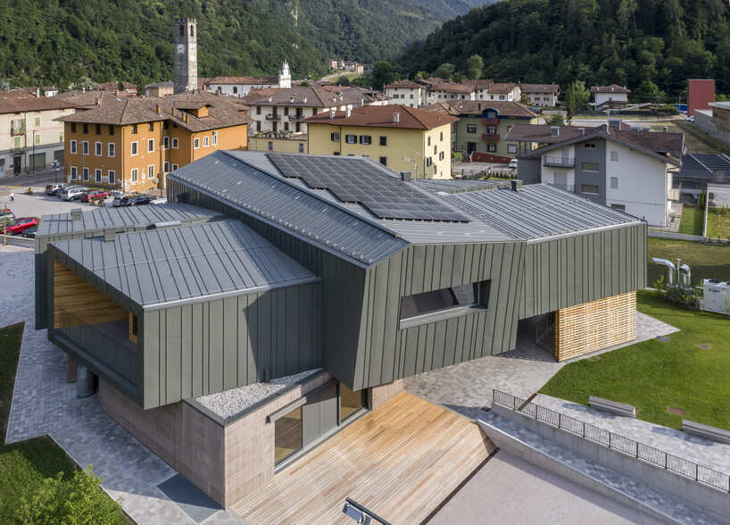 ENG group’s youth center in italian village is composed of juxtaposing superimposed volumes