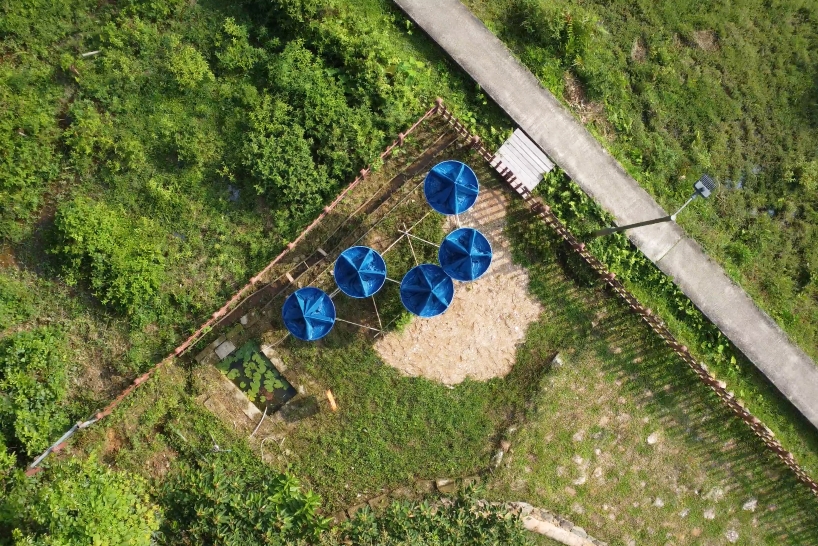 five blue water droplet baskets by canalside studio harvest rainwater in rural hong kong