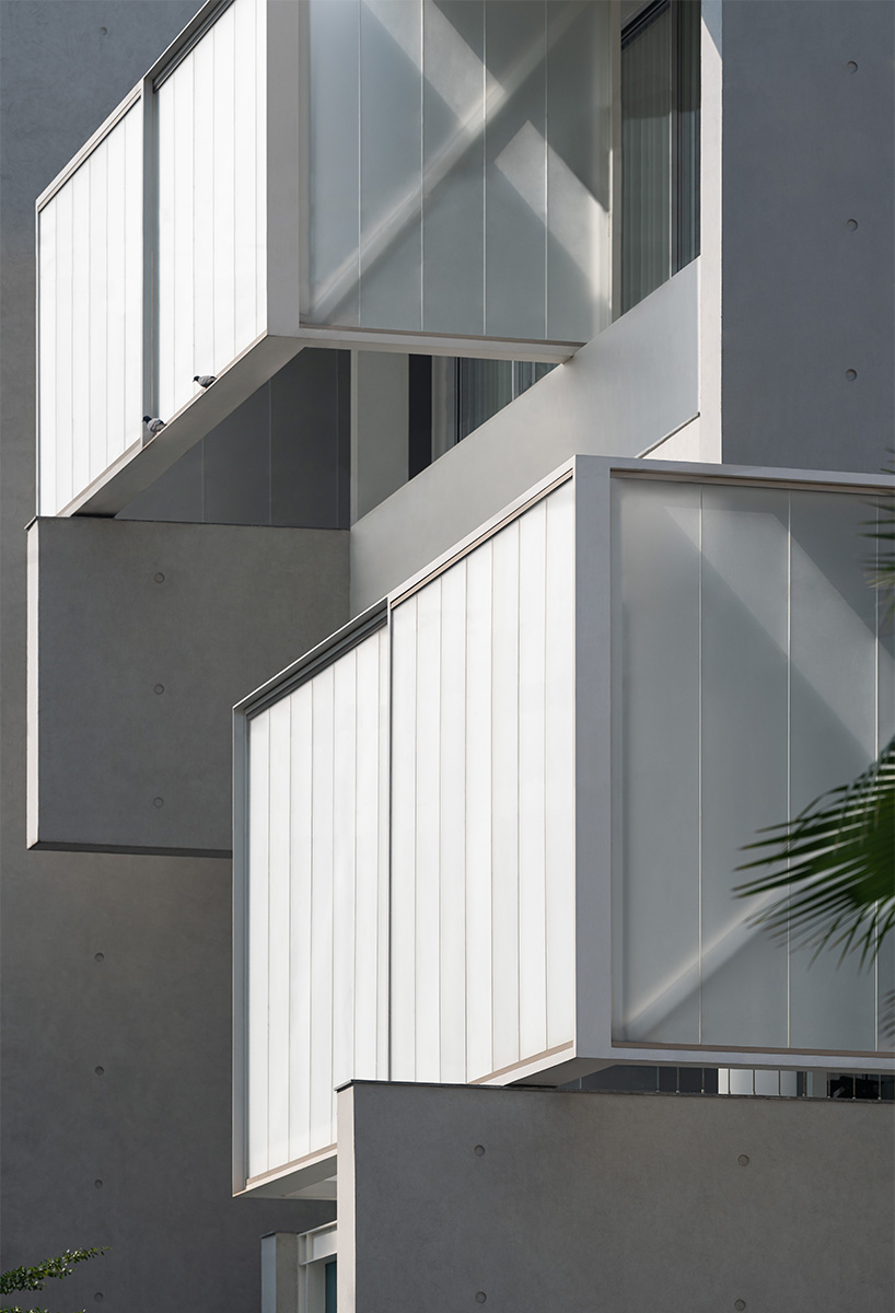 an interplay of restrained volumes and voids composes residence_bb 214 in india