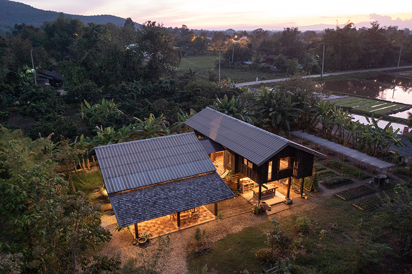 local wood joinery technique assembles roofed residence in northern thailand