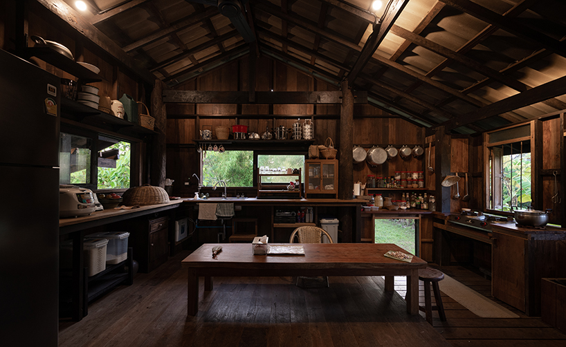 local wood joinery technique assembles roofed residence in northern thailand