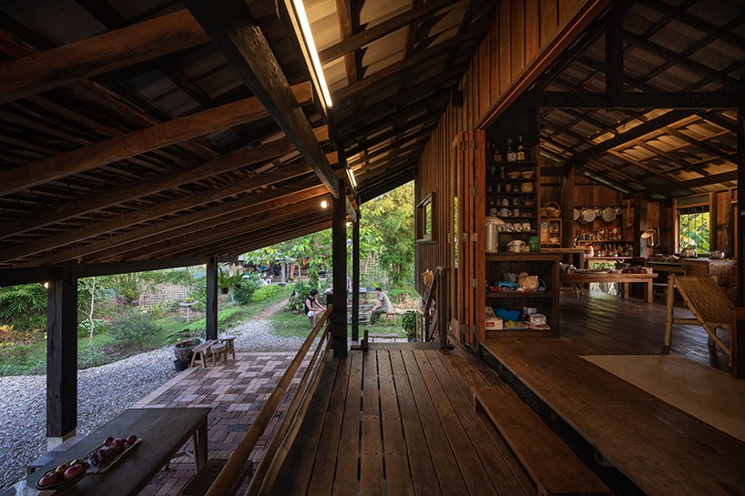 local wood joinery technique assembles roofed residence in northern thailand