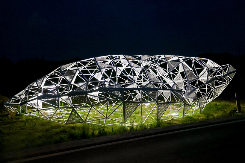 dream installation by penda assembles lace-like patterns out of welded metal