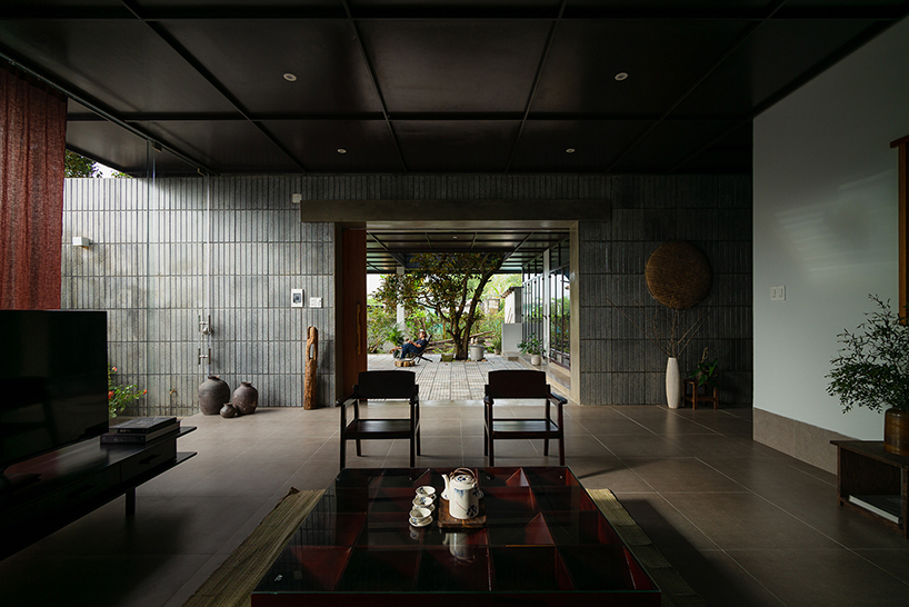 cement blocks and iron lattice enclose private courtyard in rural vietnam