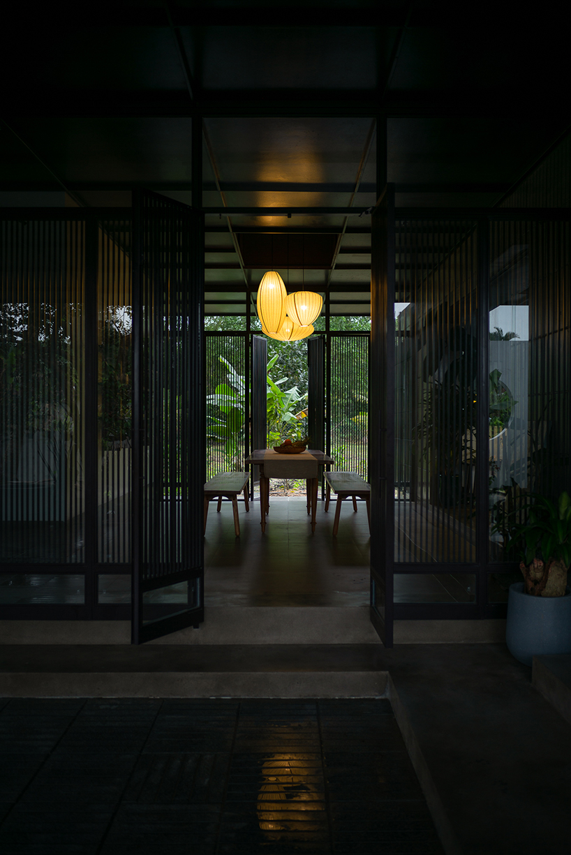 cement blocks and iron lattice enclose private courtyard in rural vietnam