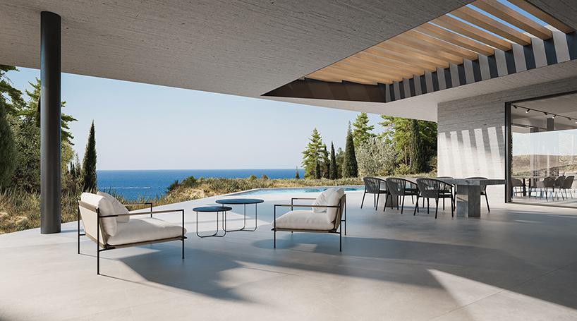 façade’s new villa wedges white prisms into the cliffs of lefkada