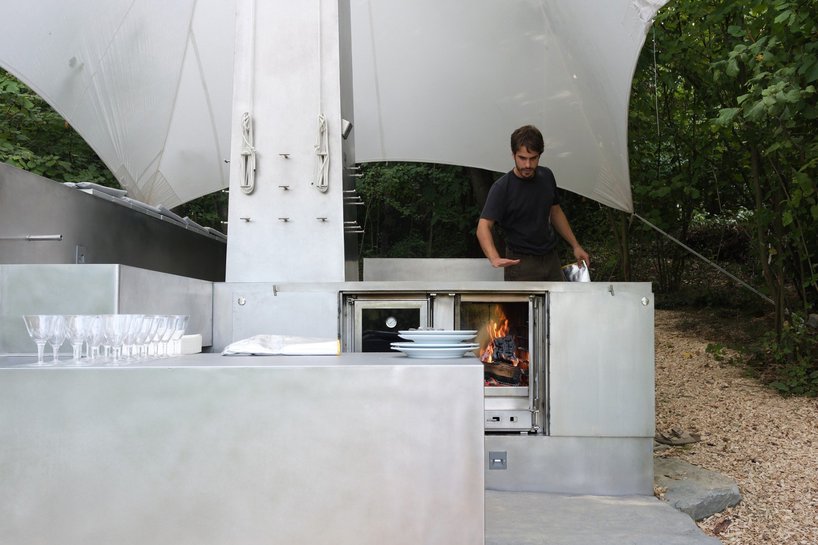 carrocerra collective's open-air steel house in italian forest reimagines ritualistic living