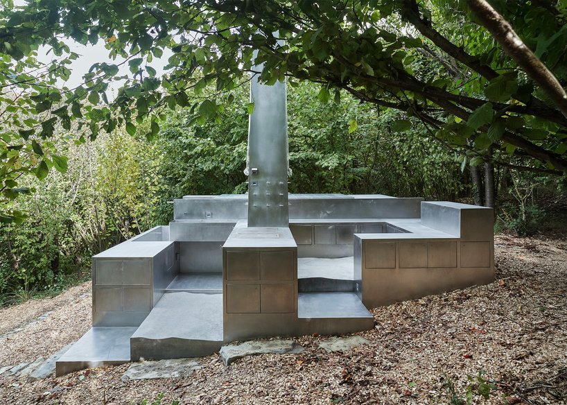 carrocerra collective's open-air steel house in italian forest reimagines ritualistic living