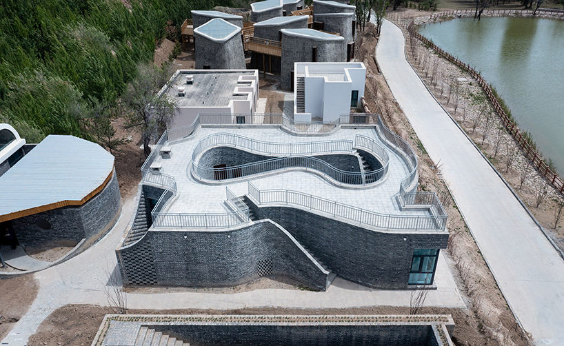 curvilinear courtyard guest house inspired by rivers and lakes in rural areas in southern china 6