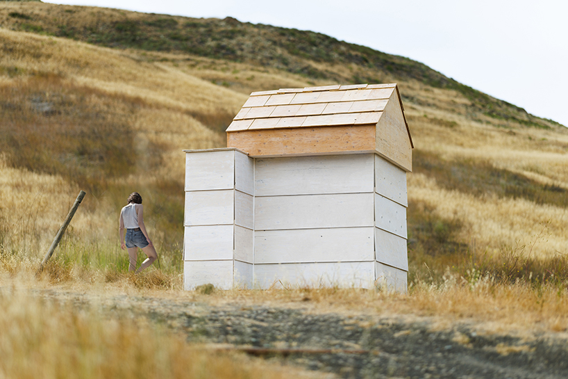 asymmetric wood installation highlights the distinct architecture of california's central valley