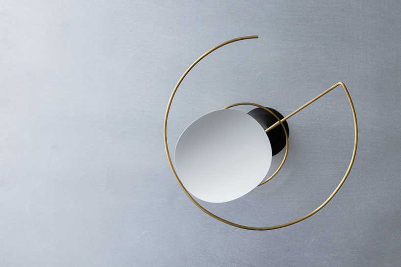 so koizumi's brass wind chime explores human emotion with delicate tensegrity structure