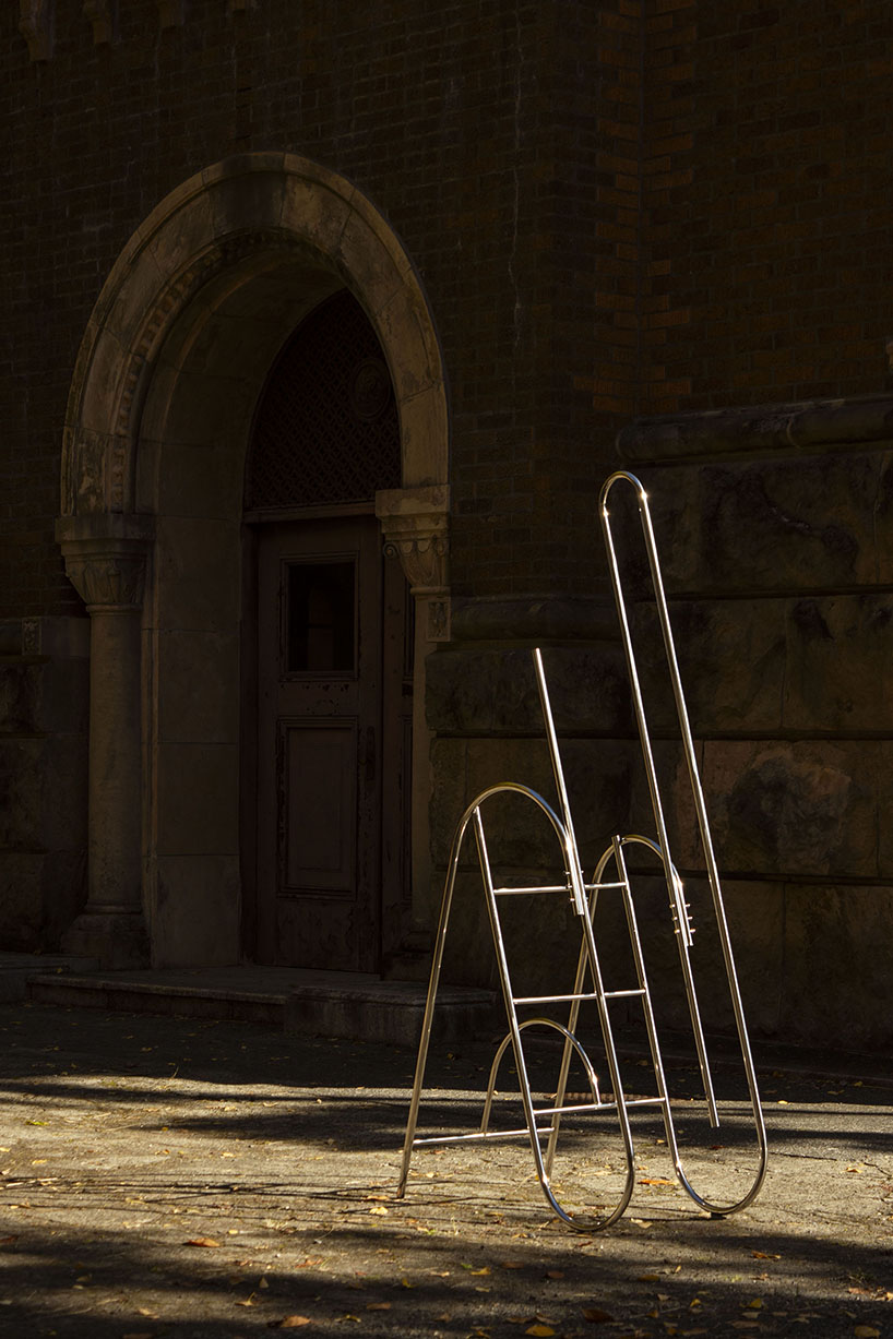 sculptural steel ladder imitates the flowing geometries of brass musical instruments - 1