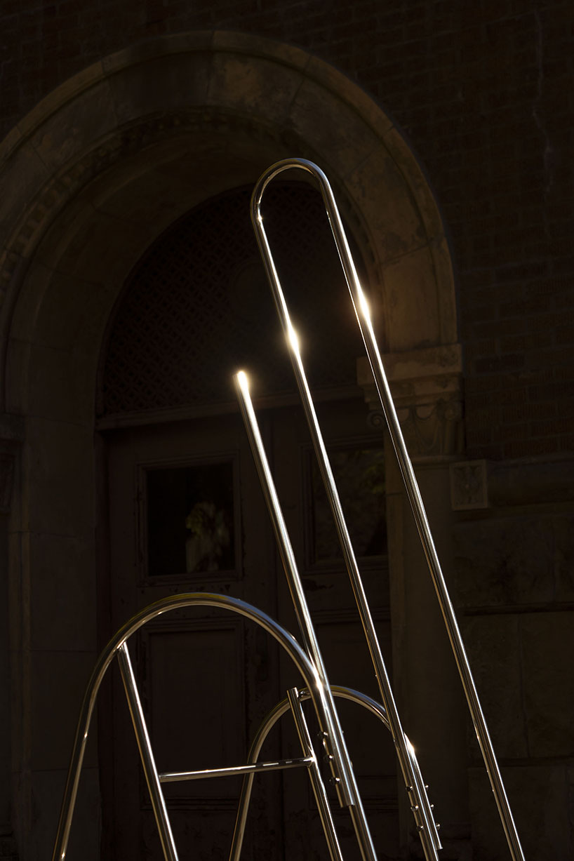 sculptural steel ladder imitates the flowing geometries of brass musical instruments - 11