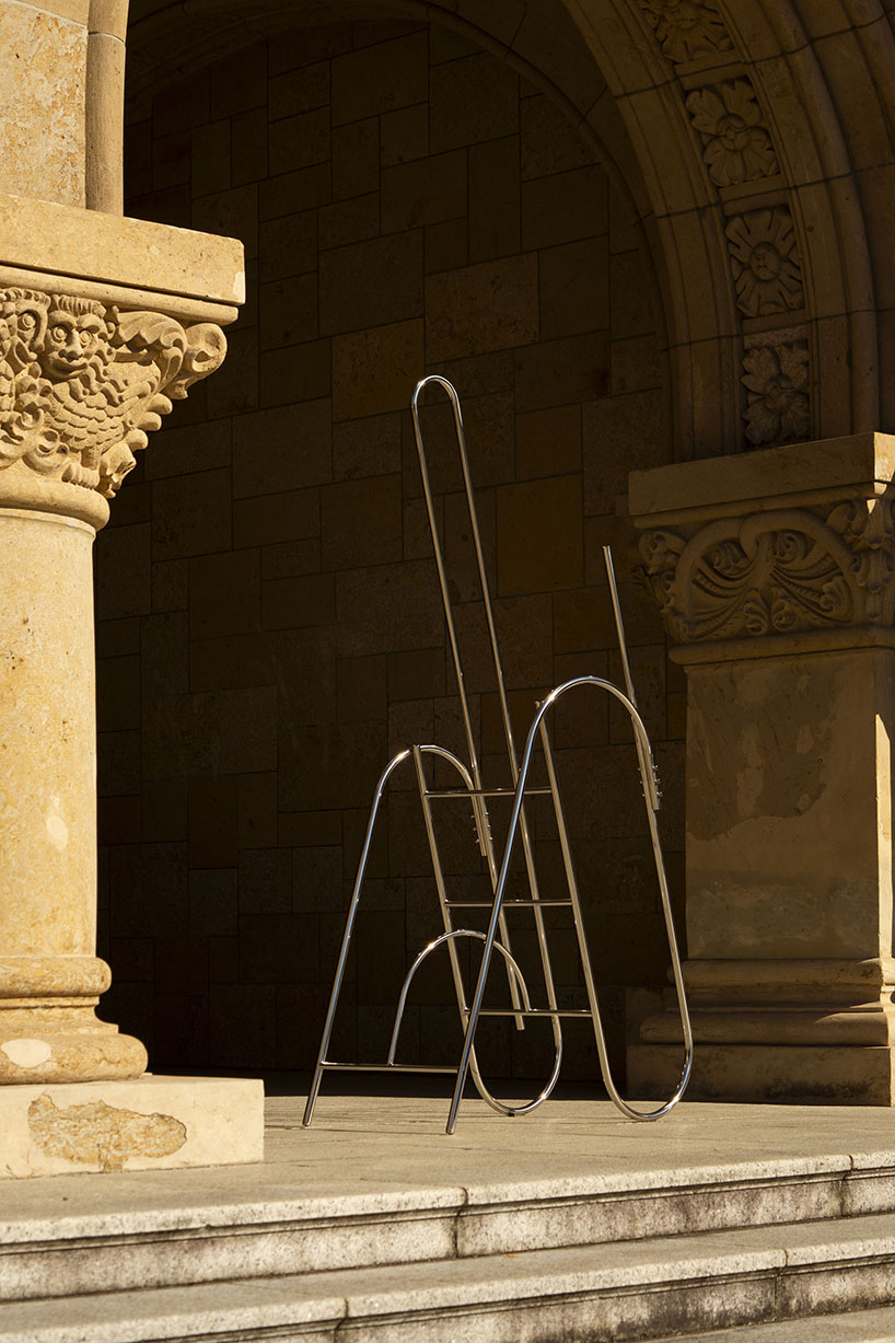 sculptural steel ladder imitates the flowing geometries of brass musical instruments - 5
