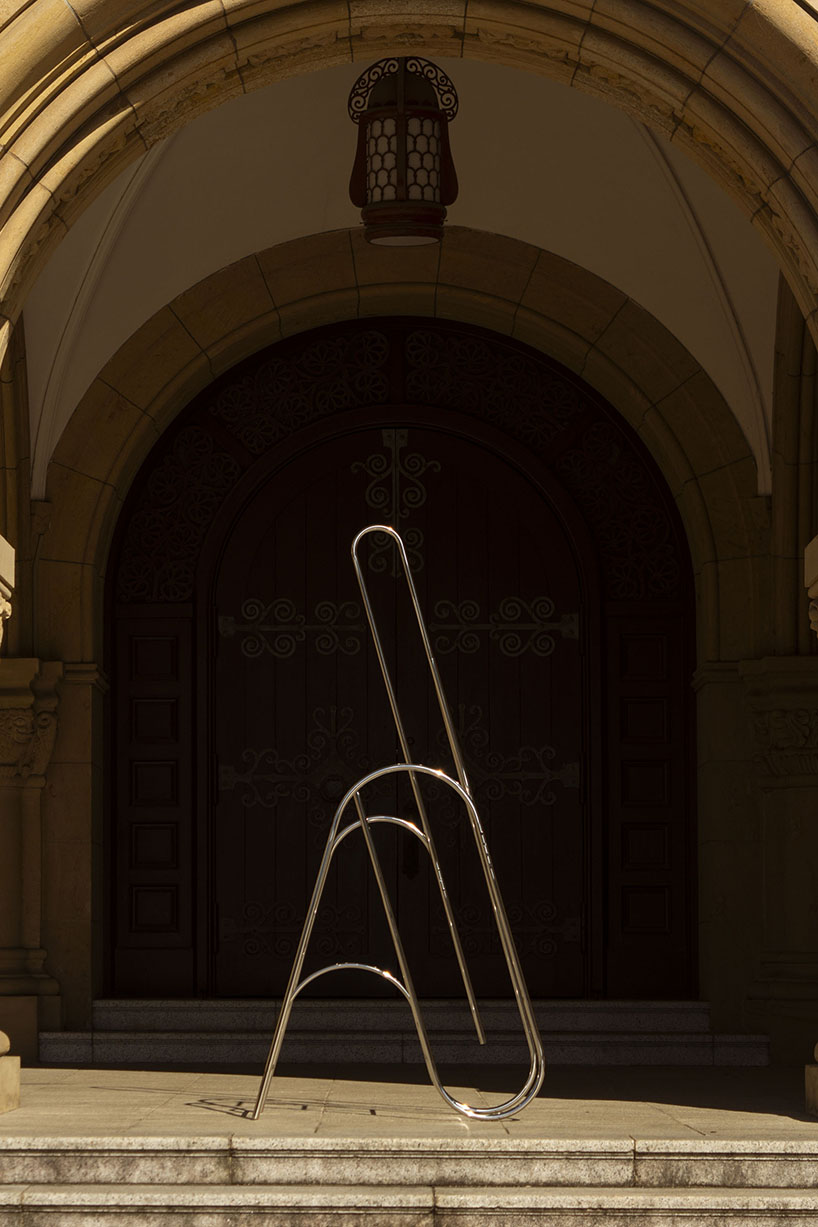 sculptural steel ladder imitates the flowing geometries of brass musical instruments - 6