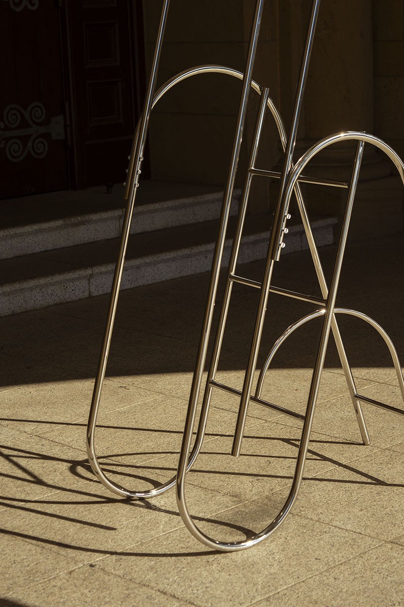 sculptural steel ladder imitates the flowing geometries of brass musical instruments - 9