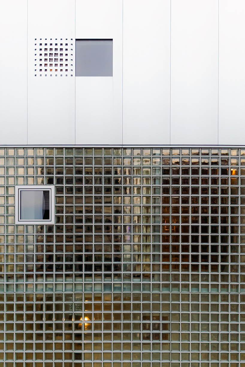 glass block facade wraps studioninedots’ playfully stacked box residence in amsterdam - 4