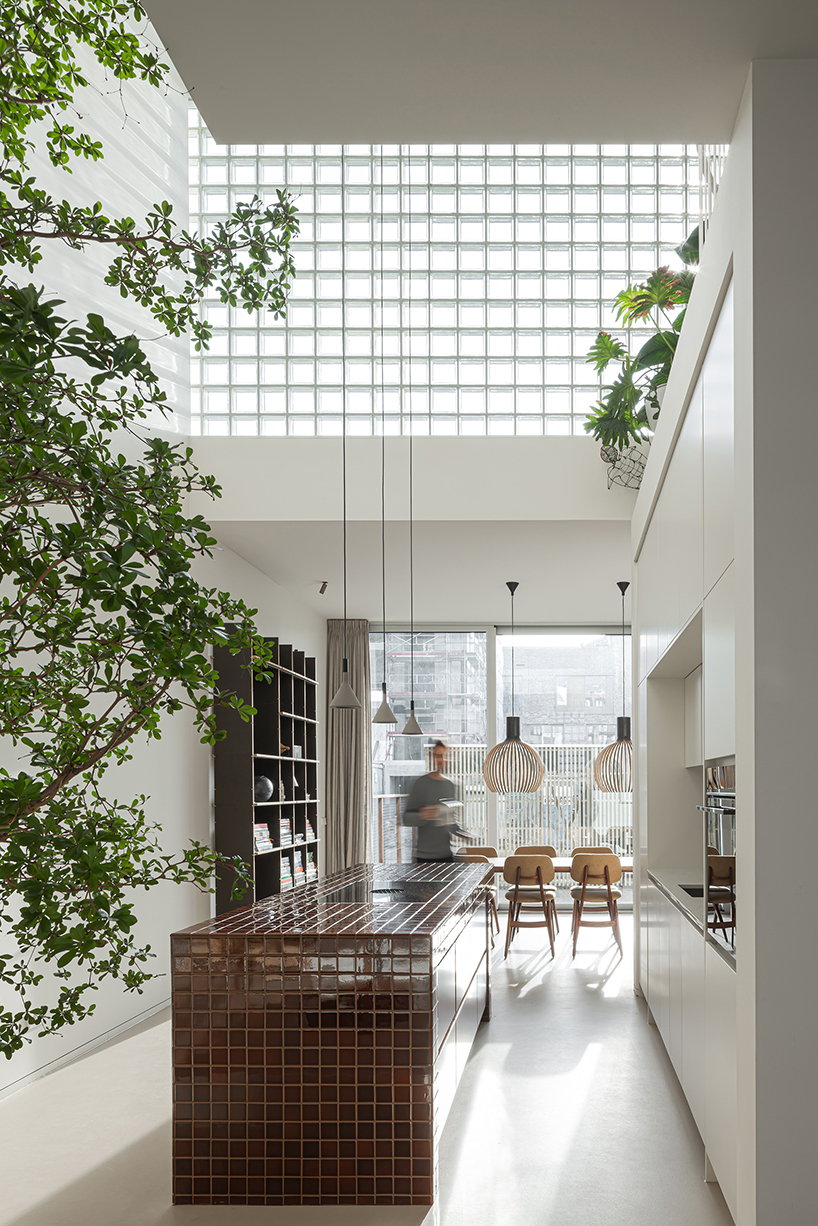 glass block facade wraps studioninedots’ playfully stacked box residence in amsterdam - 6