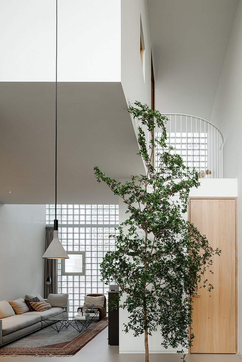 glass block facade wraps studioninedots’ playfully stacked box residence in amsterdam - 8