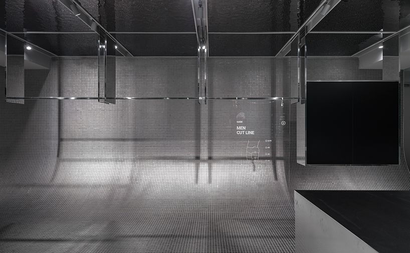 steel interiors ripple like waves in niiiz design lab's korean swimwear store