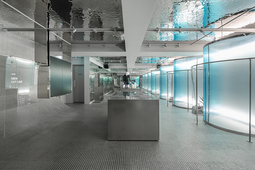 steel interiors ripple like waves in niiiz design lab's korean swimwear store