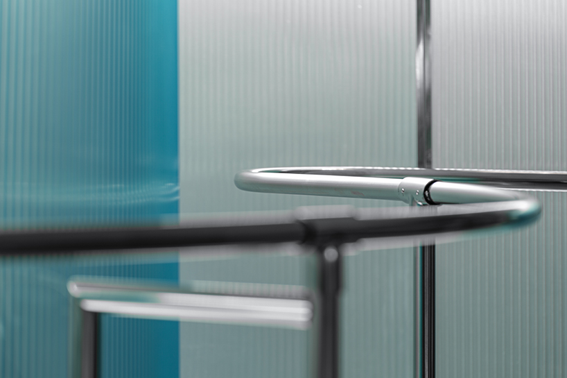 steel interiors ripple like waves in niiiz design lab's korean swimwear store