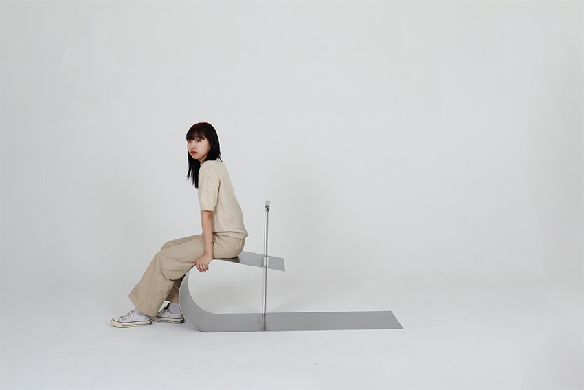 &omni chair curves into an & symbol to foster connectivity with our surroundings