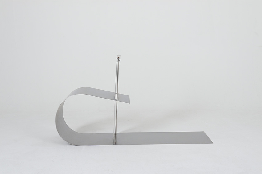 &omni chair curves into an & symbol to foster connectivity with our surroundings