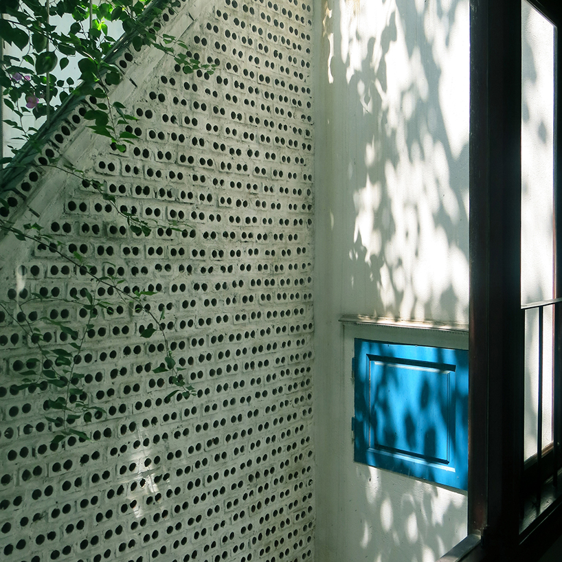 La casa de 'DAD' en Vietnam coloca una pared de ladrillos para un flujo de aire máximo