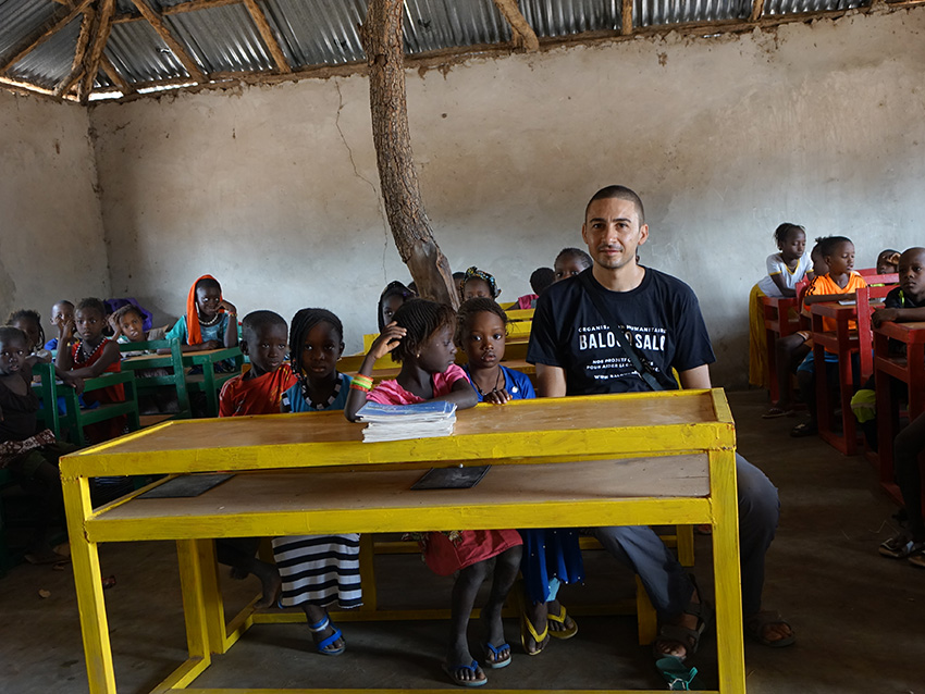 balouo salo and local artisans handcraft wooden furniture for underprivileged schools in rural senegal