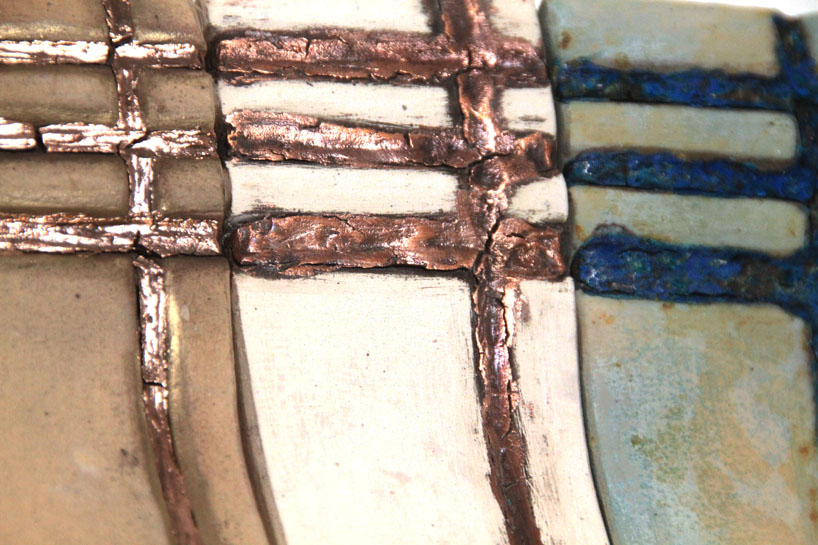 Yuval Harel colored ceramic tiles enhance the union of raw clay with metal through oxidation and corrosion
