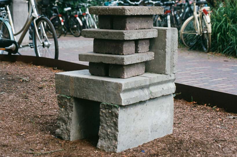 'stacked street' re-curates the city, transforming forgotten bricks & curbs into street furniture