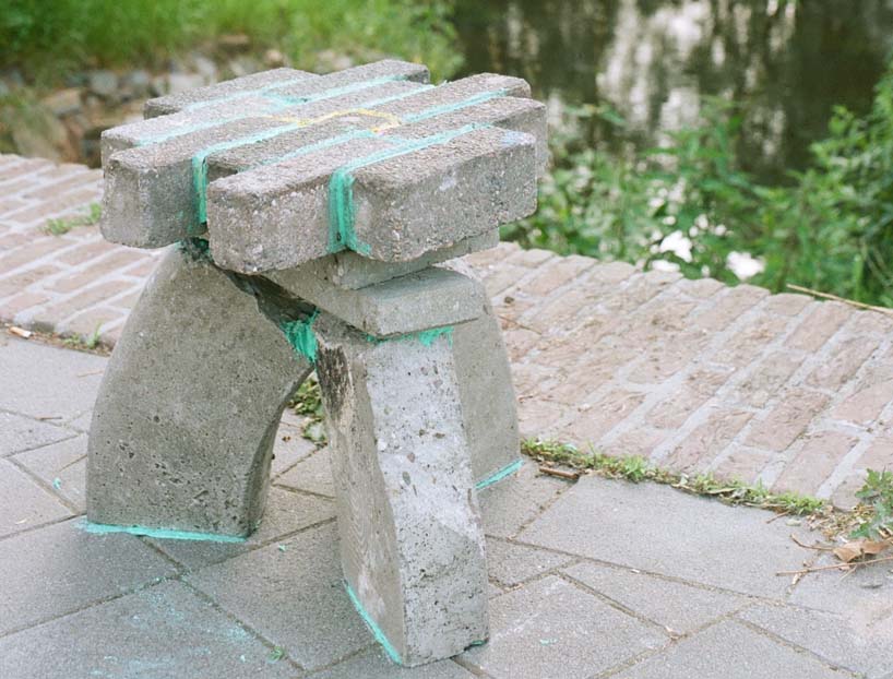 'stacked street' re-curates the city, transforming forgotten bricks & curbs into street furniture