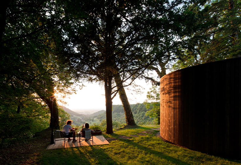 lumipod 6 takes shape as rounded wooden hotel cabin in the french countryside