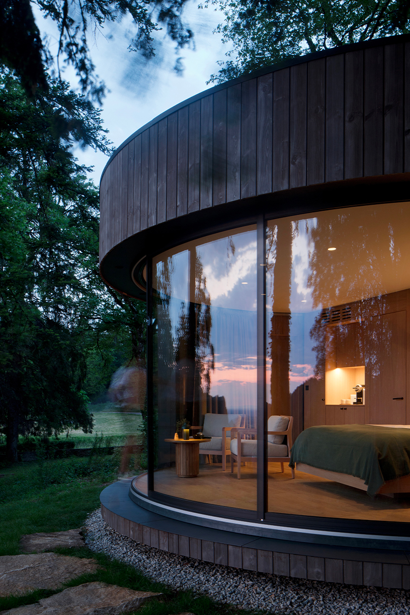 lumipod 6 takes shape as rounded wooden hotel cabin in the french countryside