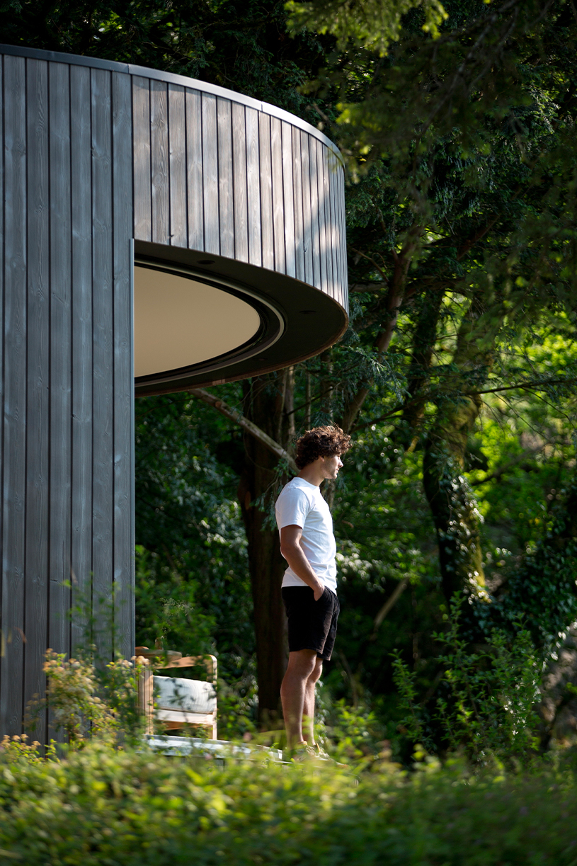 lumipod 6 takes shape as rounded wooden hotel cabin in french countryside